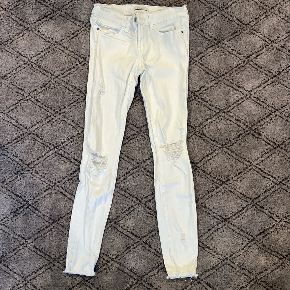 White Skinny Jeans with Distressed Details